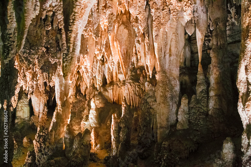 The beautiful stalactites and stalagmites and other rock formations are reflected in a small lake in the Antro del Monte Corchia cave in the Apuan Alps in Italy.