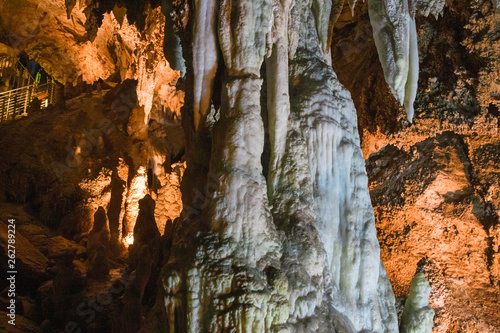 The beautiful stalactites and stalagmites and other rock formations are reflected in a small lake in the Antro del Monte Corchia cave in the Apuan Alps in Italy.