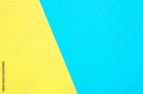 Geometric paper background. Yellow and turquoise color paper texture background.- Image