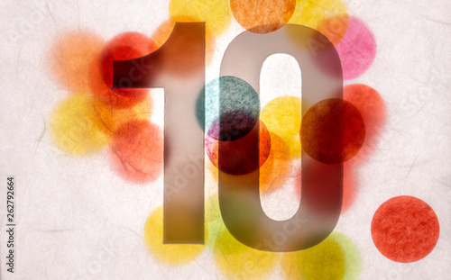 10 number ten, graphic black digit and creative typography with many colourful wheels, happy birthday