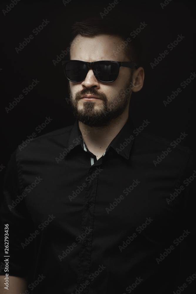 Portrait of Man in Black Indoors