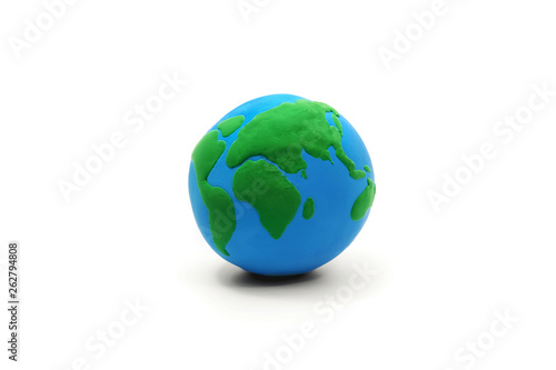 a clay globe on white