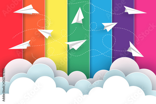 Many white paper planes fly on the background rainbow colorful while flying above a cloud. creative idea. illustration cartoon vector