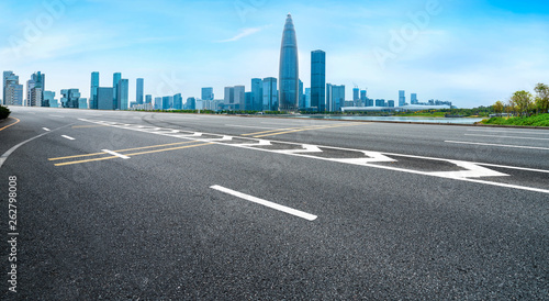 Road and skyline of urban architecture..