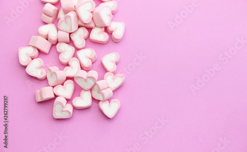 Flat lay template design top view pink marshmallows on sweet background with copy space