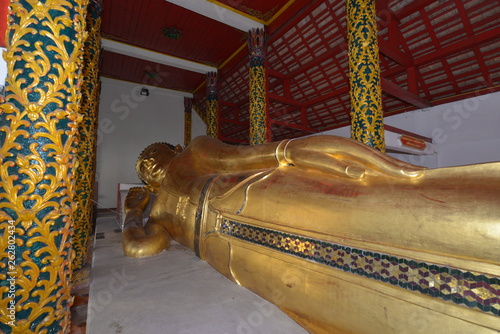 reclining buddha in thailand photo