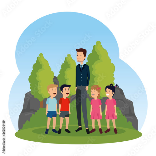 young teacher male with little students in the field
