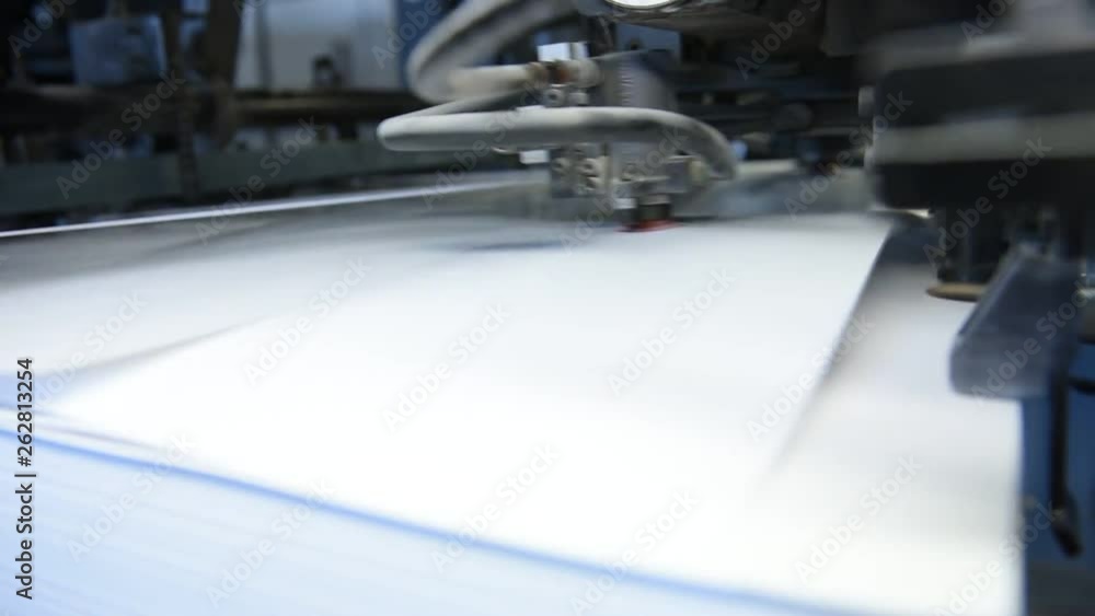 Offset printing. Printed sheets of paper are served in the printing press by vacuum Offset printing. Printed sheets of paper are served in the printing press by vacuum