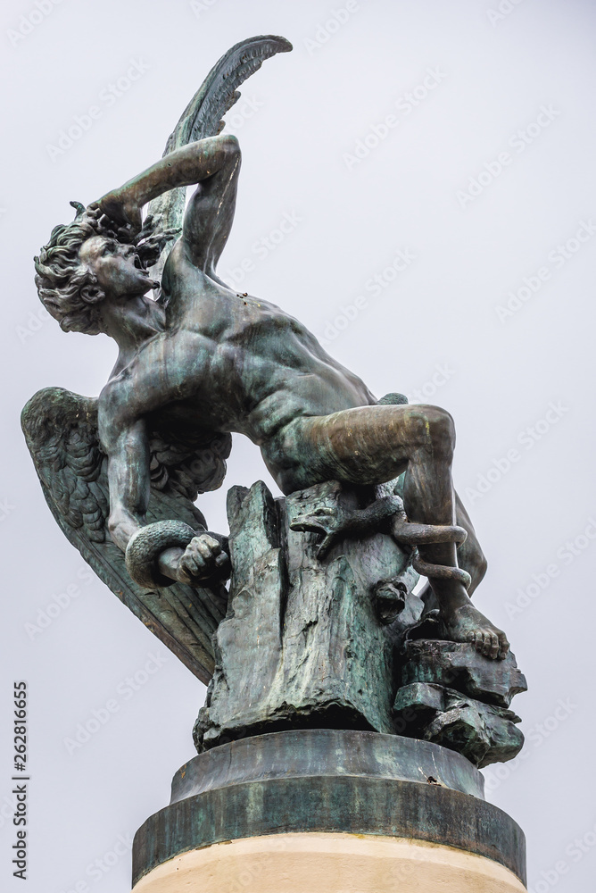 Statue of Fallen Angel on a the fountain in Buen Retiro Park also called simply El Retiro in Madrid, capital city of Spain