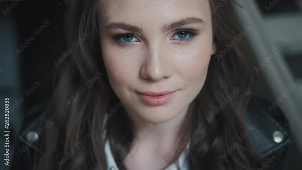 Closeup portrait of an attractive girl with bright blue eyes. Closeup portrait of an attractive girl with bright blue eyes.