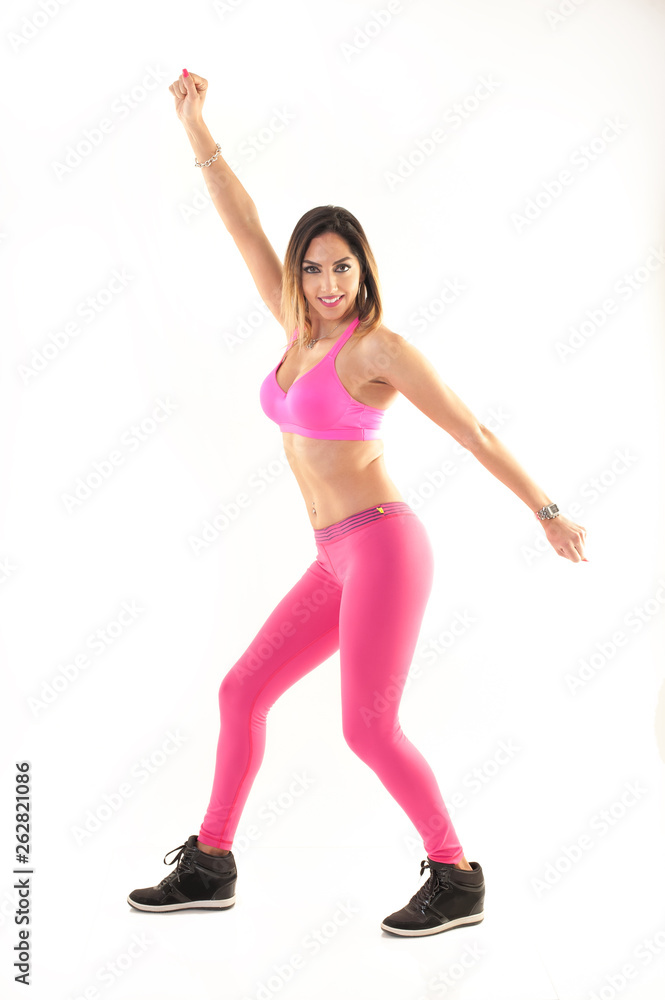 Zumba dance fitness instructor doing sport aerobic exercises. Motivational coach Zumba dance fitness instructor doing sport aerobic exercises. Motivational coach