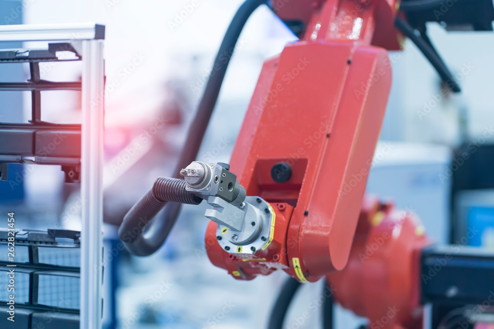 robot arm is working smartly in the production department in artificial intelligence factory robot arm is working smartly in the production department in artificial intelligence factory
