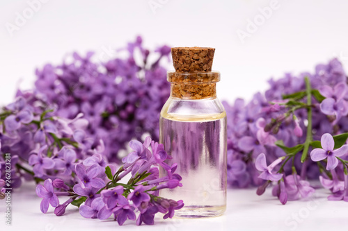 Essential oil in a beautiful bottle on the table