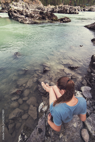 Woman resting at river