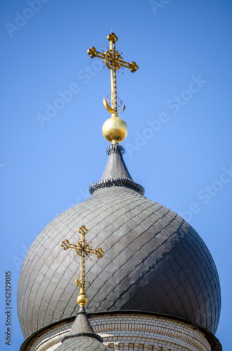 Copper dome and Golden crosses of the Church Of our lady of Kazan