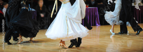 Obraz na plátně woman and man dancer latino international dancing