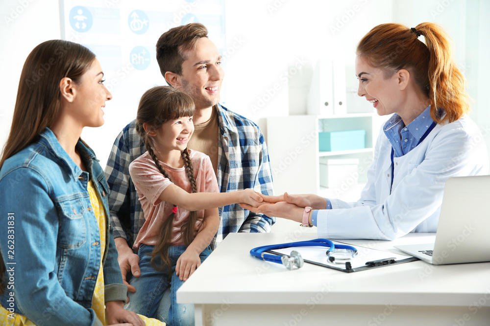 Fototapeta premium Family with child visiting doctor in hospital