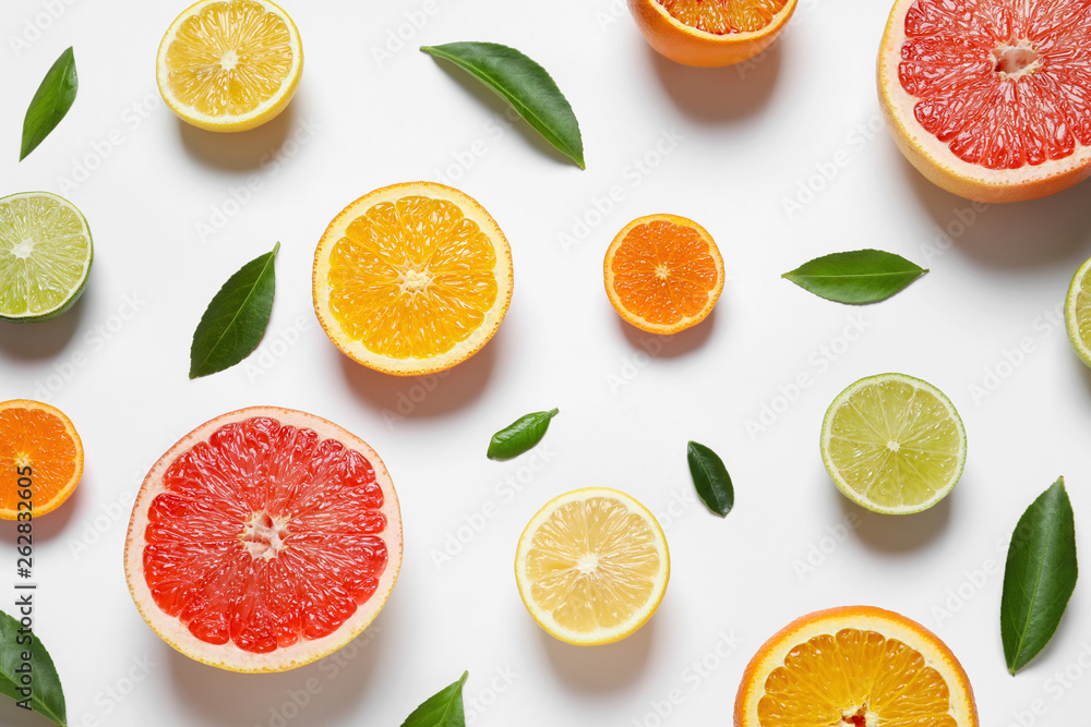 Flat lay composition with different citrus fruits on white background Flat lay composition with different citrus fruits on white background