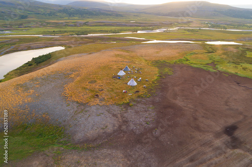 View from height on a settlement of nomads reindeer breeders in the valley of the Longotjyogan River (aerial photography). Polar Ural Mountains, Russia photo