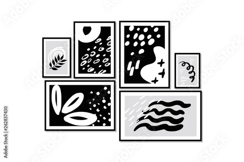 Abstract pictures  in frame on room wall.