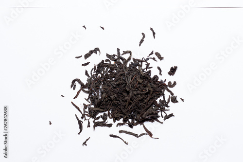 black tea leaves on white background