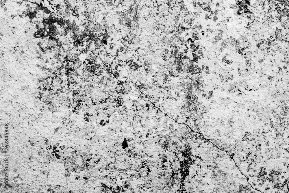 Fototapeta premium Wall fragment with scratches and cracks
