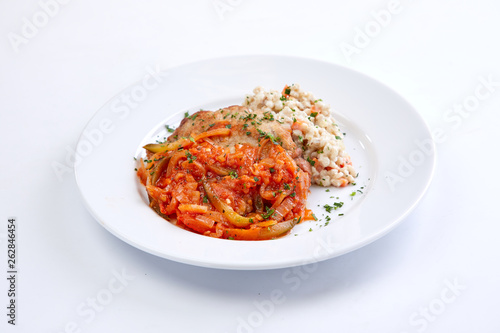 cutlet with barley on the white background
