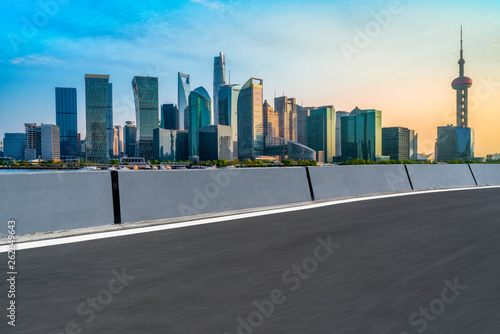 Canvas Print Empty Asphalt Road Through Modern City of Shanghai, China..