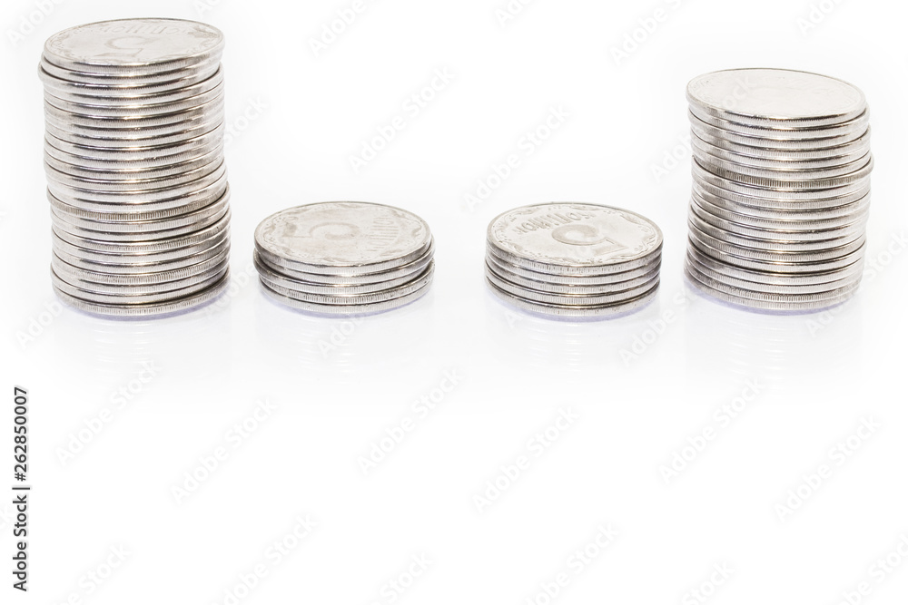 Business money graph coins on white background Business money graph coins on white background