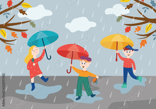 Cheerful children playing under umbrella in rainy weather outdoors in autumn park or garden.