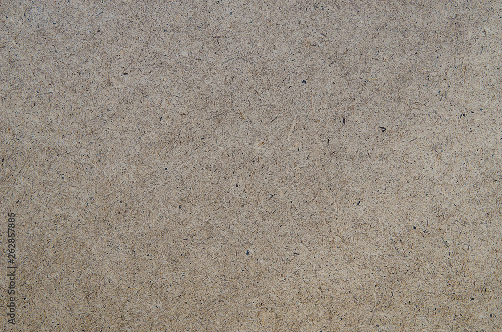 Top view hardboard plywood material front side texture made from pressed sawdust Top view hardboard plywood material front side texture made from pressed sawdust