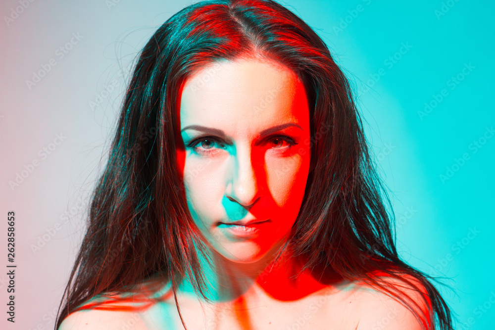 Neon portrait of young prety girl in red and green Neon portrait of young prety girl in red and green