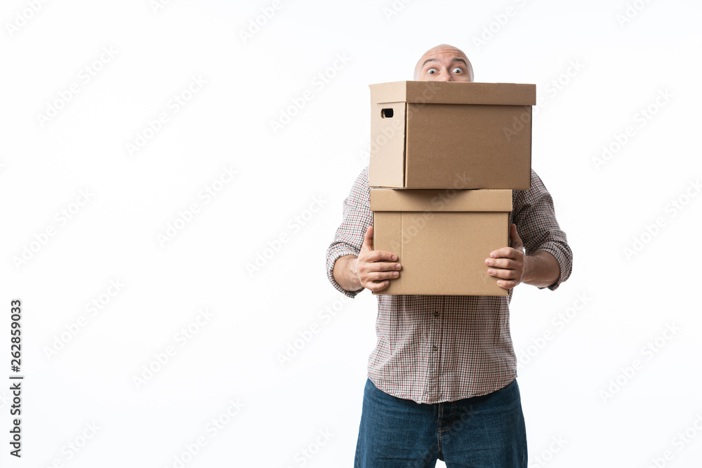 Portrait of a handsome young man holding card boxes, isolated on white Portrait of a handsome young man holding card boxes, isolated on white