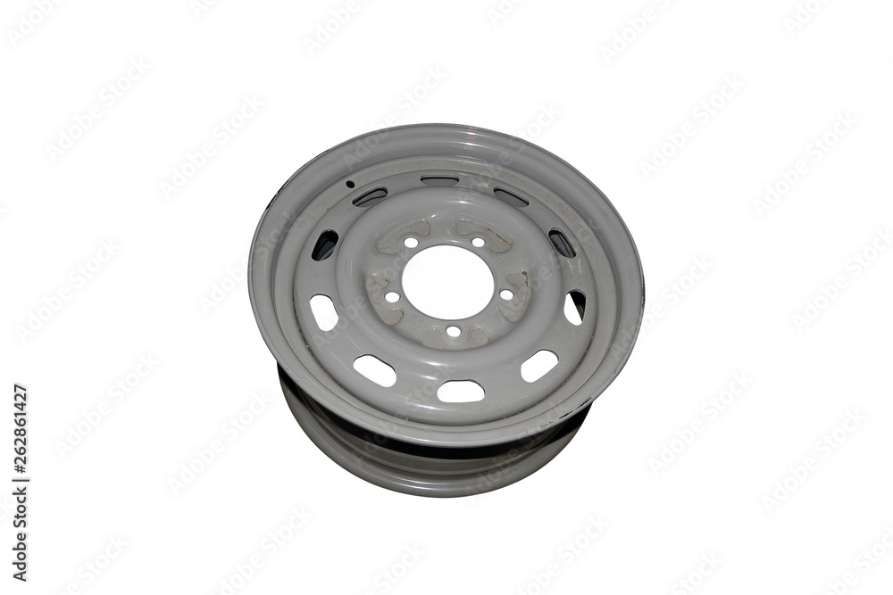 Car stamped disc. Gray car stamped disc on a white surface. Car stamped disc. Gray car stamped disc on a white surface.