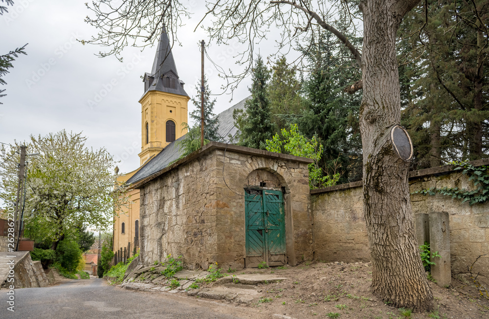 Tokaj, Hungary: narrow hillside street with the reformed church. Tokaj is the center of the world-renowned Tokaj Wine Region