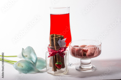 A glass of red ice cream drink. White Koala on white background.