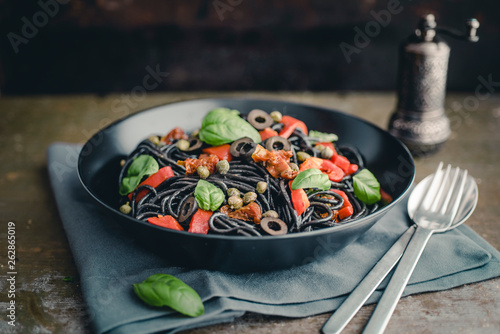 Food: Spaghetti sepia with dried tomato, grilled bell pepper
