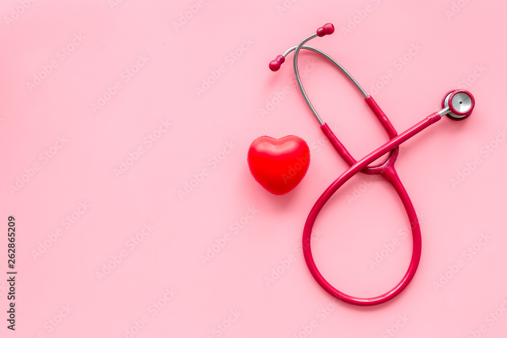 stethoscope and heart for diagnostic and cure of heart disease on pink background top view mockup stethoscope and heart for diagnostic and cure of heart disease on pink background top view mockup