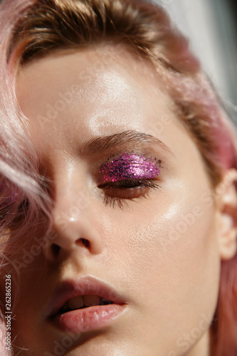 Woman with glittering eyeshadow
