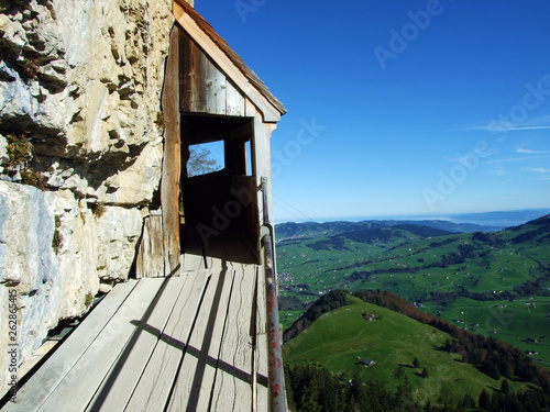 Hermit's houses or Nachgebautes Eremitenhaus (Eremitenhäuschen oder Eremitenhaeuschen) in the Alpstein mountain range and in the Appenzellerland region - Canton of Appenzell Innerrhoden, Switzerland photo
