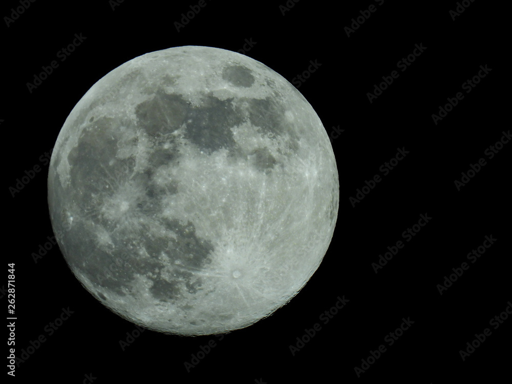 Fototapeta premium a full moon in the starry night sky