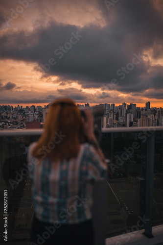 Girl looking to the city