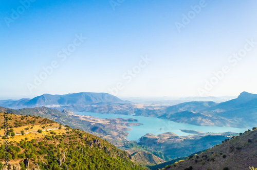 The lake of Zahara de la Sierra between the mountains, landscape of Andalusia, Spain