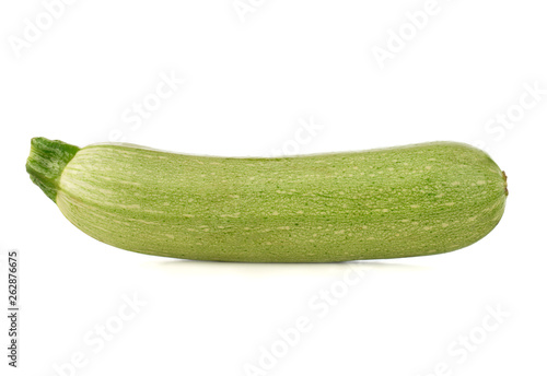 Zucchini on a white background. Green fresh zucchini closeup.