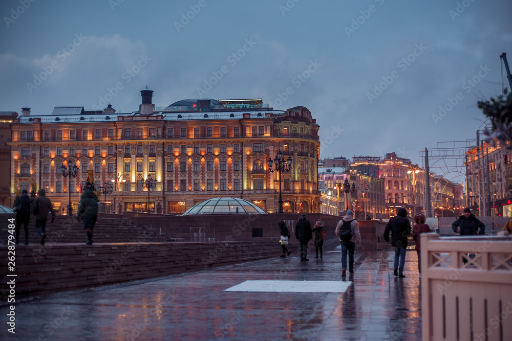 Fototapeta premium Snowy evening in Moscow. Manezhnaya Square