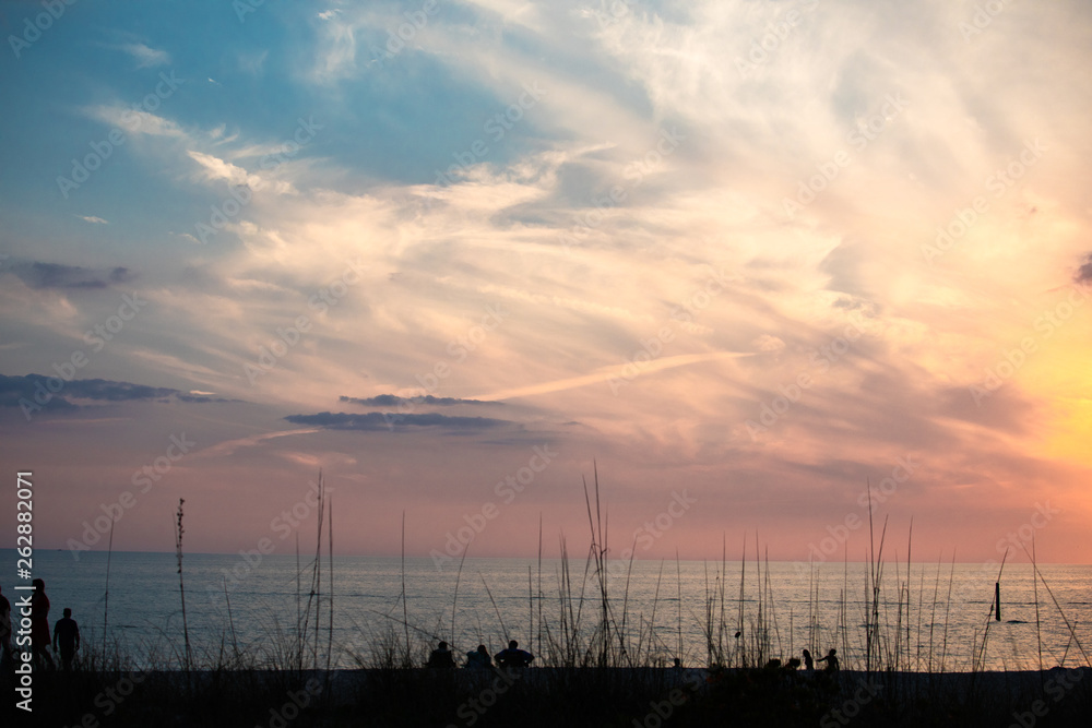 Stunning picturesque clouds during sunset, seen from a beach on the Gulf of Mexico near Englewood, Florida, USA, in early spring