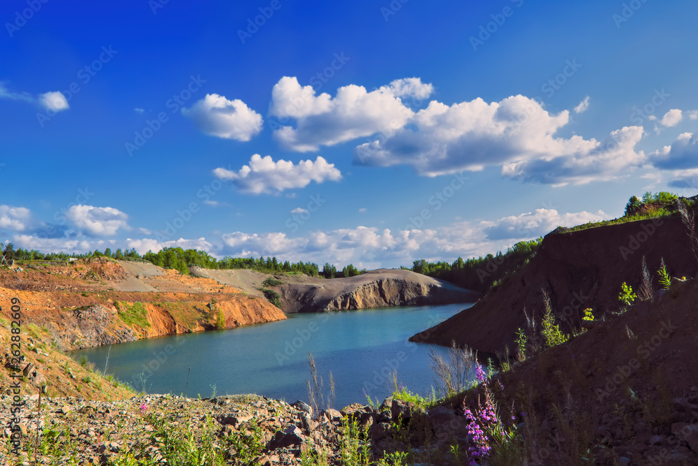 Summer landscape on the shore of a mountain lake. Summer landscape on the shore of a mountain lake.