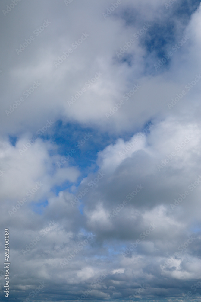 blue sky with white clouds to horizon portrait orientation blue sky with white clouds to horizon portrait orientation