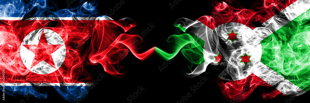 North Korea vs Burundi, Burundian smoky mystic flags placed side by side. Thick colored silky smoke flags of North Korea and Burundi, Burundian. North Korea vs Burundi, Burundian smoky mystic flags placed side by side. Thick colored silky smoke flags of North Korea and Burundi, Burundian.
