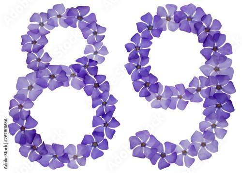 Numeral 89, eighty nine, from natural blue flowers of periwinkle, isolated on white background photo